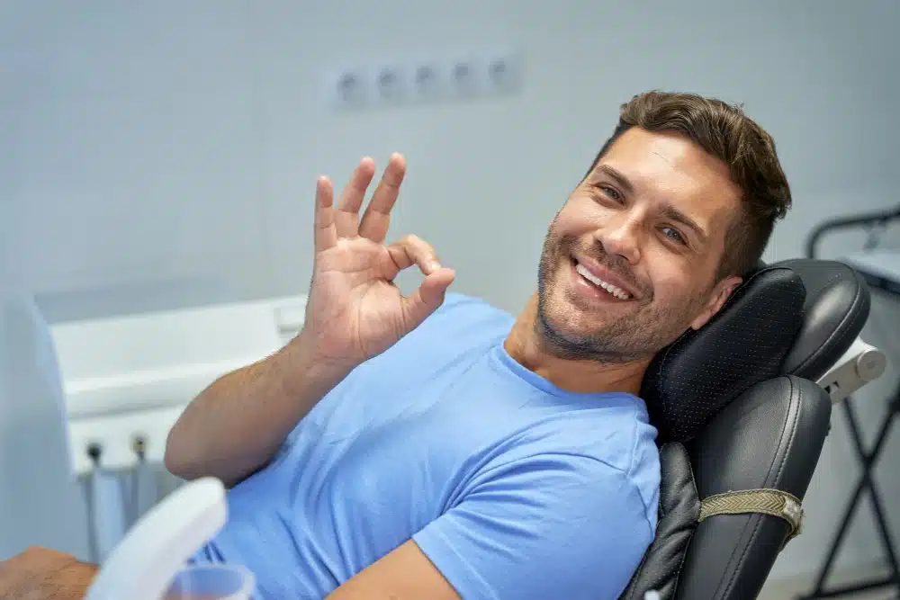 Patient after a successful dental filling in Mansfield, TX.